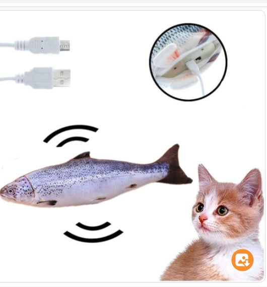 Muezza shoppe interactive fish cat toy with USB charging cable and realistic fish design next to curious cat